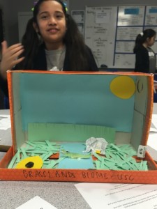 student with grasslands biome
